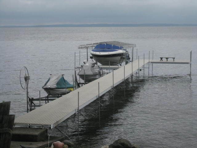 Teal premier dock installed on waterfront property